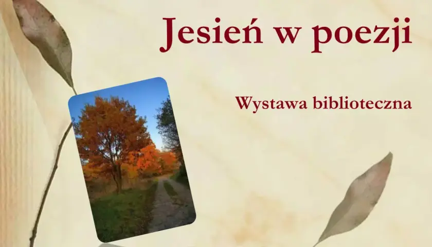 Jesień w poezji: wystawa biblioteczna. Wiatr jesienny szumi wśród drzew, inspirując do tworzenia wierszy.